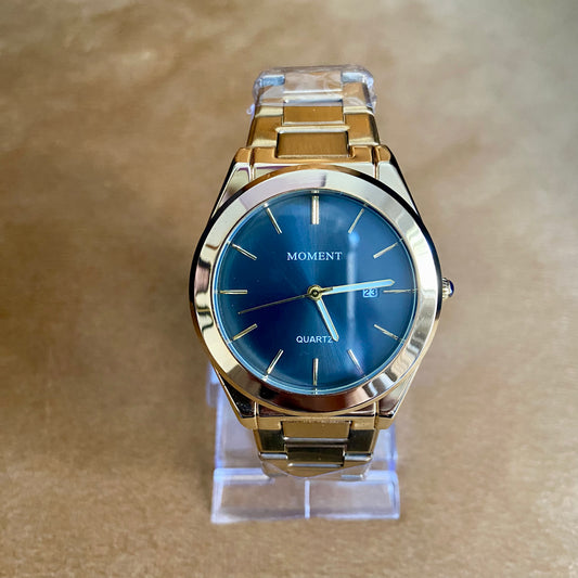 Moment Gold Stainless Steel Quartz Watch – Blue Dial, Date Display